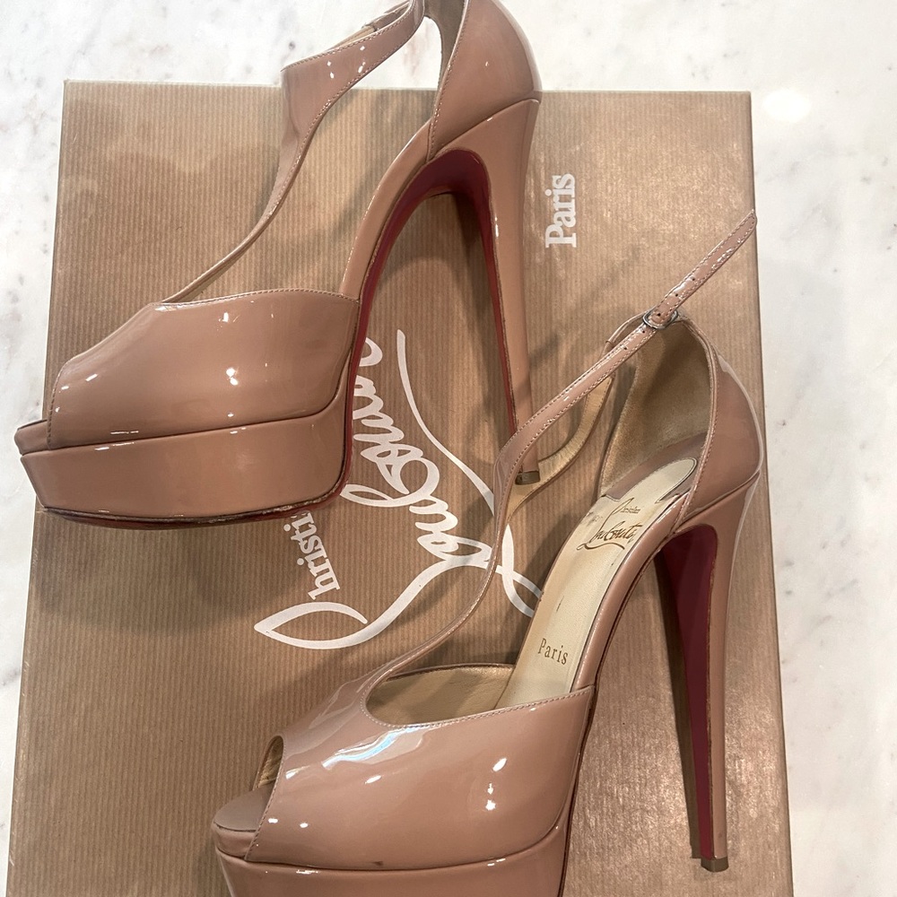 Christian Louboutin stiletto. (Only worn once.) Size 38.5